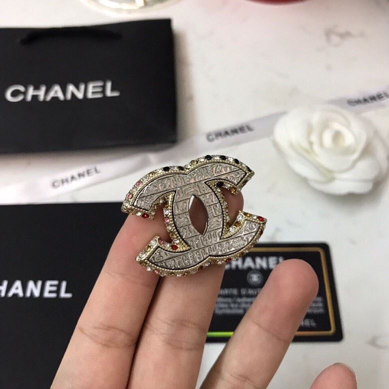 Ch**el brooches